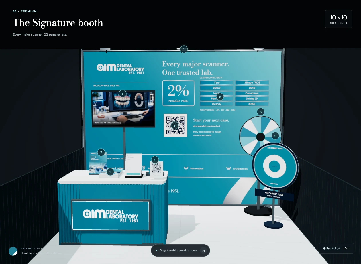 Aisle view: review the backwall, counter, signage and engagement stations from a visitor’s approach.